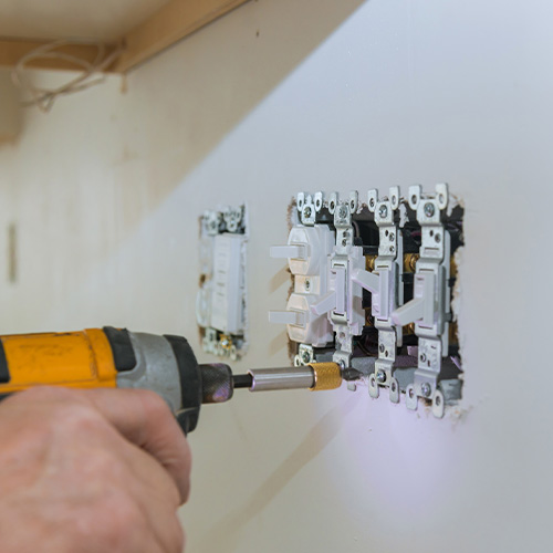 Work on installing electrical outlets.
