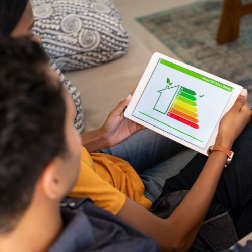 Couple watching house energy efficiency