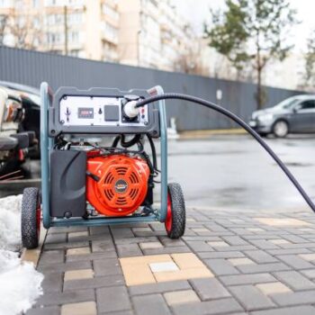 Electek - Power supply generator placed on street sidewalk. outdoor diesel power generator