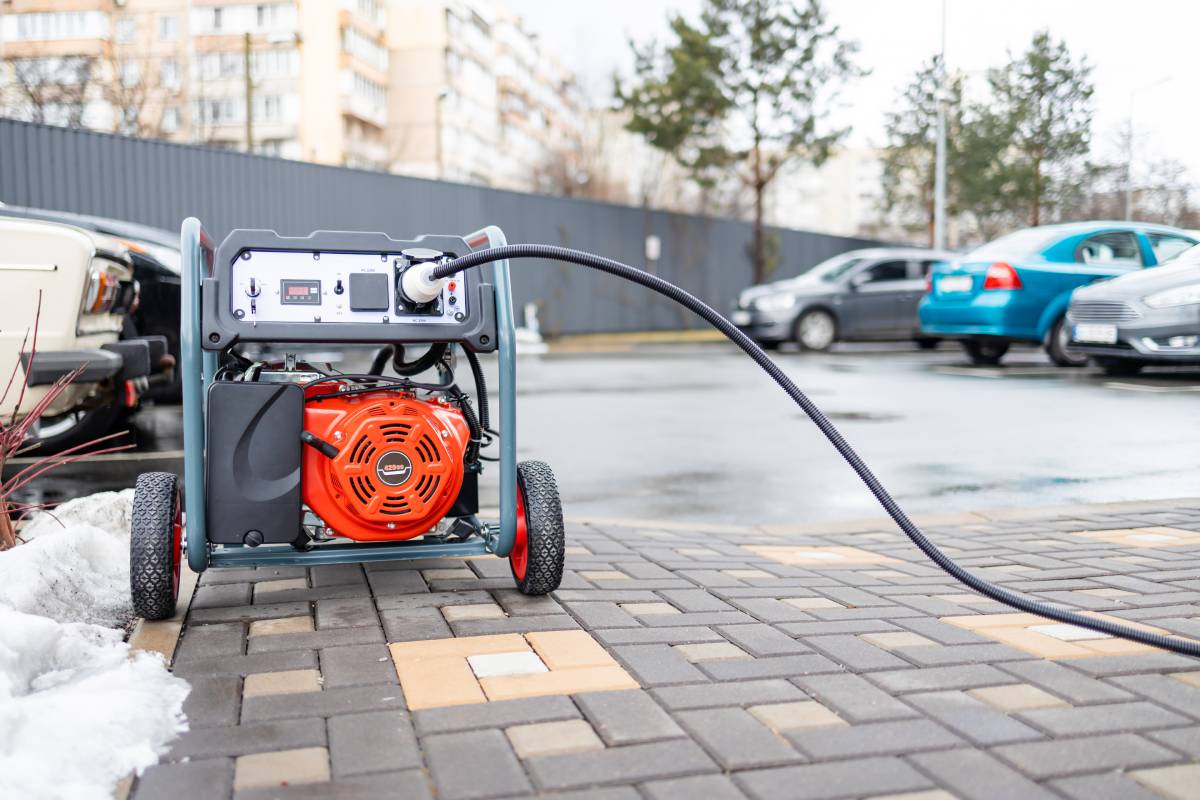Electek Inc - Power supply generator placed on street sidewalk. outdoor diesel power generator