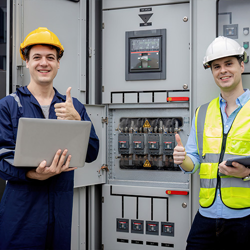 Electrical engineer working in control room.
